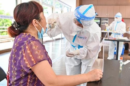 广州18万人居家“战疫”:物资供应“最后一百米”的“接力赛”